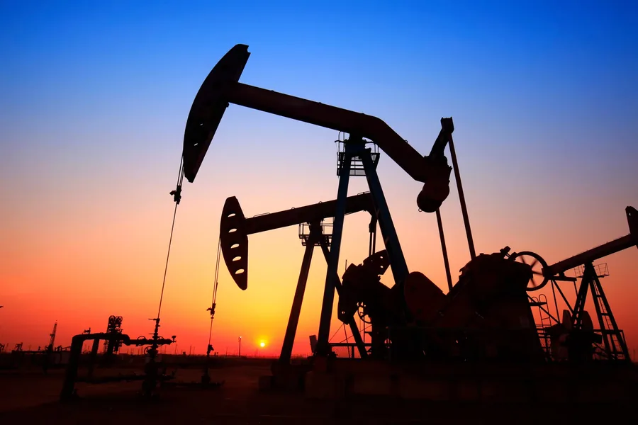 Oil wells on producing land